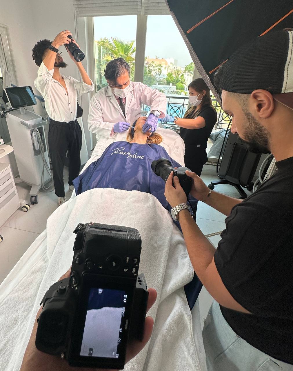 Photography and video team at work in a clinic